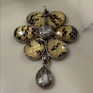 Elegant Gold and Silver Floral Pendant